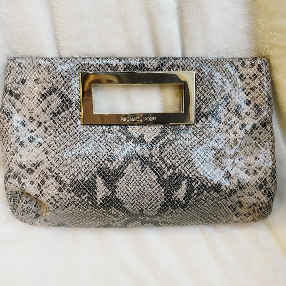 Micheal Kors Tan Snakeskin Clutch w/ Gold Trim.  Minor Scratches on Hardware